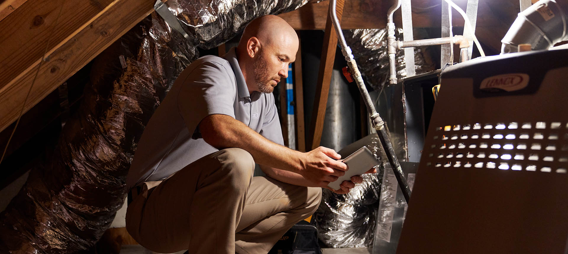 Technician installing a furnace
